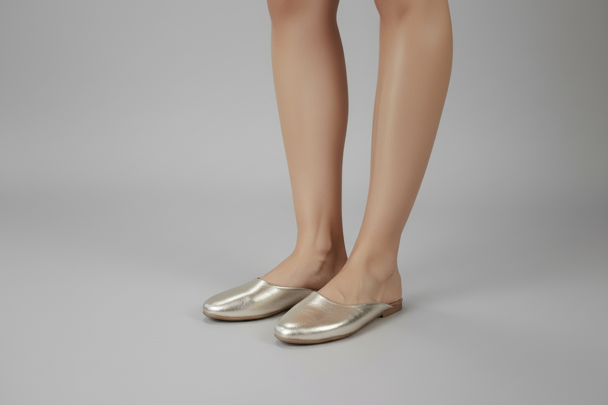 Aura Metallic Mules Gold