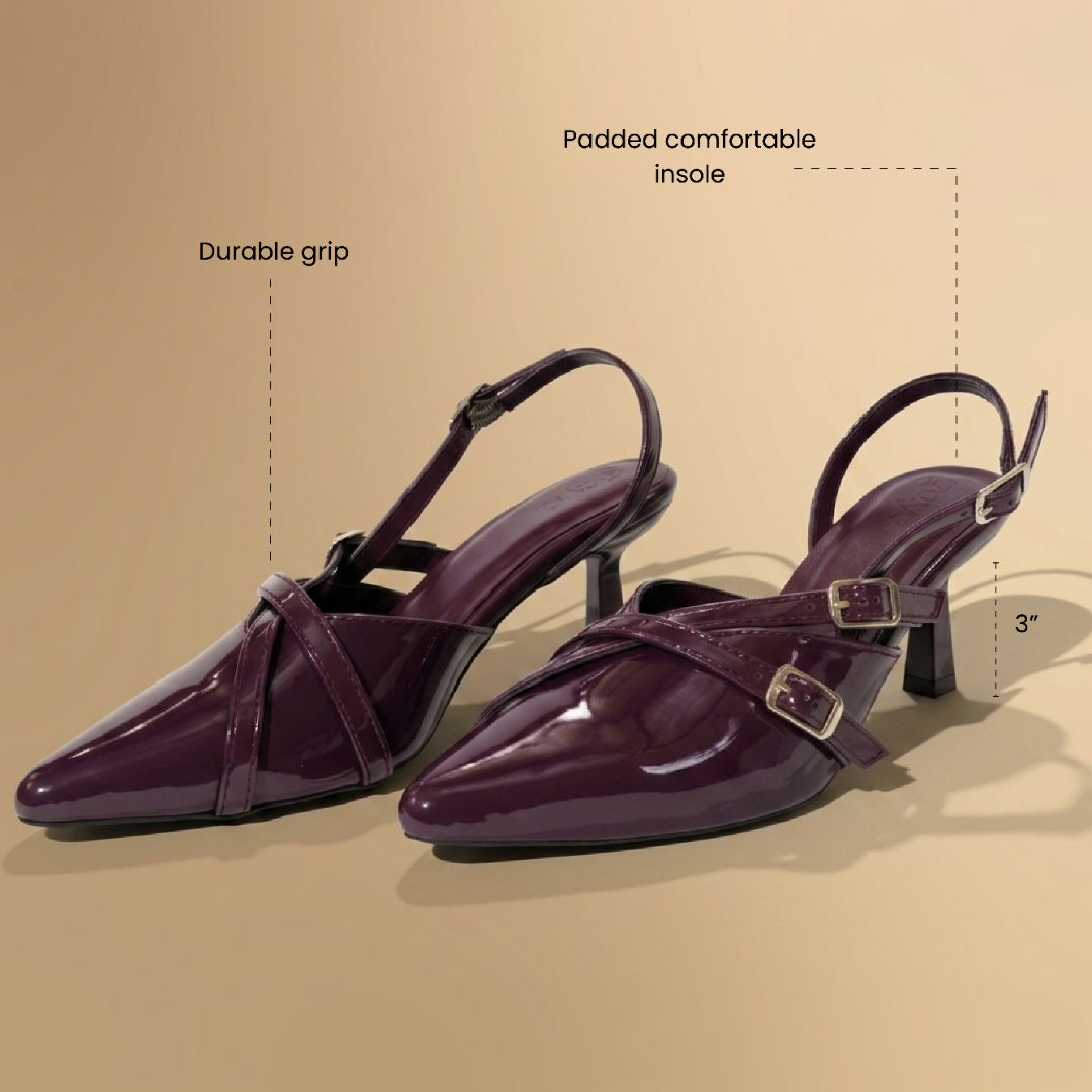 Purple high-heeled shoes with text on a beige background